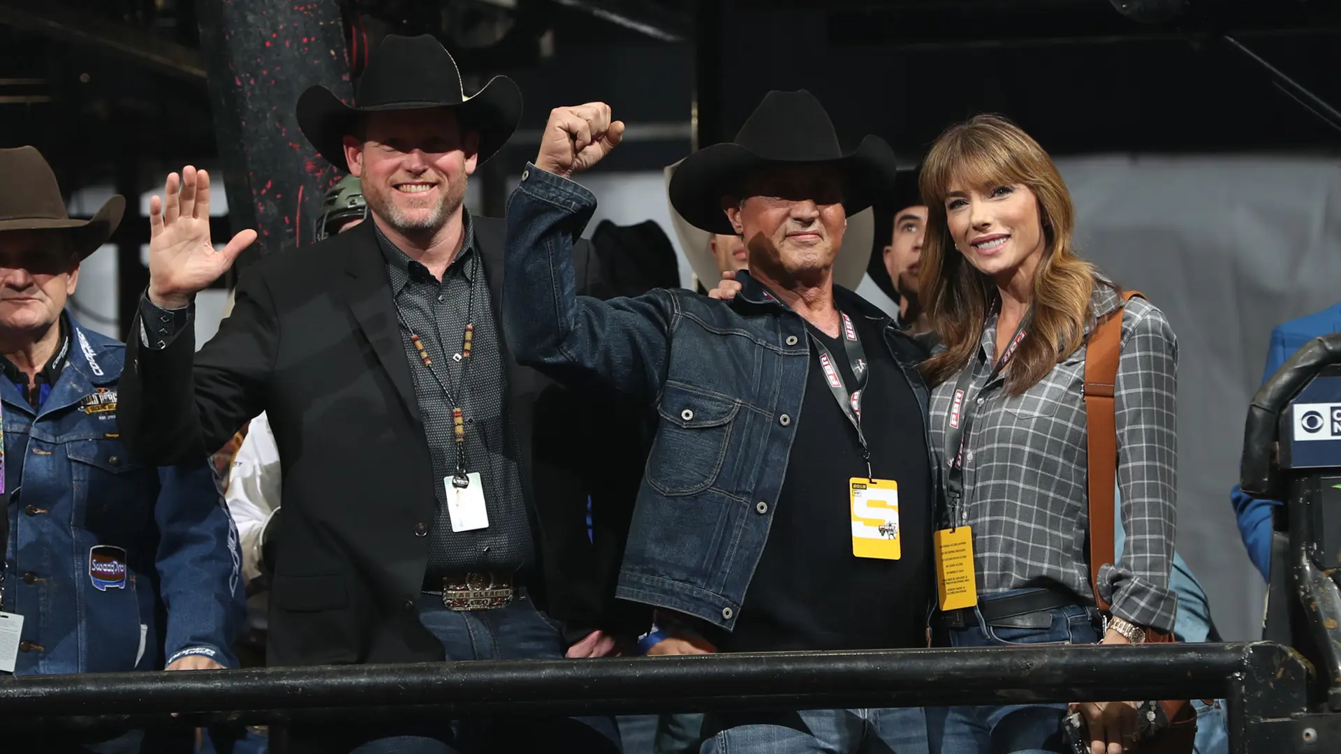 Stallone takes in PBR event and watches bull Yo Adrian! buck